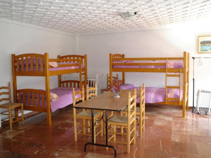 La Casa De Abajo